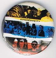 File:Synchronicity Sting yellow Stewart blue Andy red larger round button.jpg
