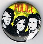 File:1979 08 Police yellow background red letters glitter round button.jpg