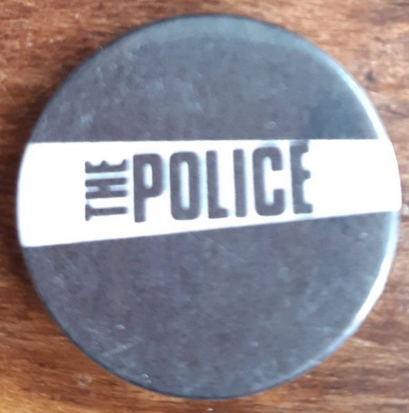 File:The Police black white button with The Force like shape.jpg