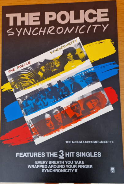 File:Synchronicity UK cardboard Toni Carbo.png