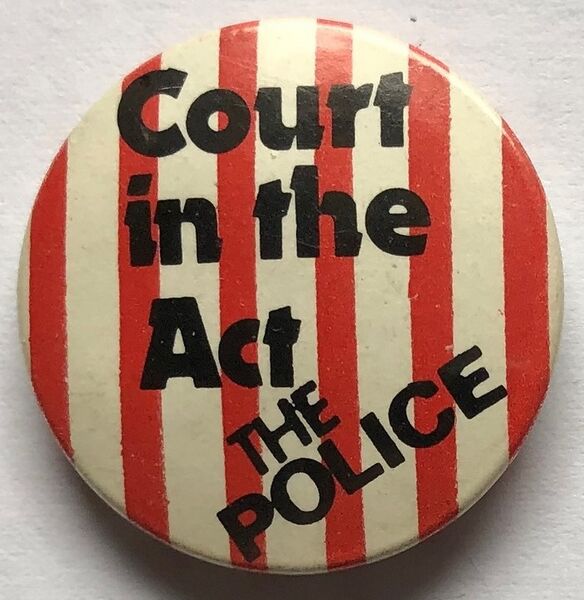File:Court In The Act The Police small red round button.jpg