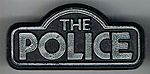 The Police different logo plastic silver.jpg
