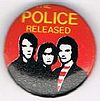 1979 08 Police released red background round button.jpg