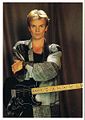 Sting grey jacket guitar postcard.jpg