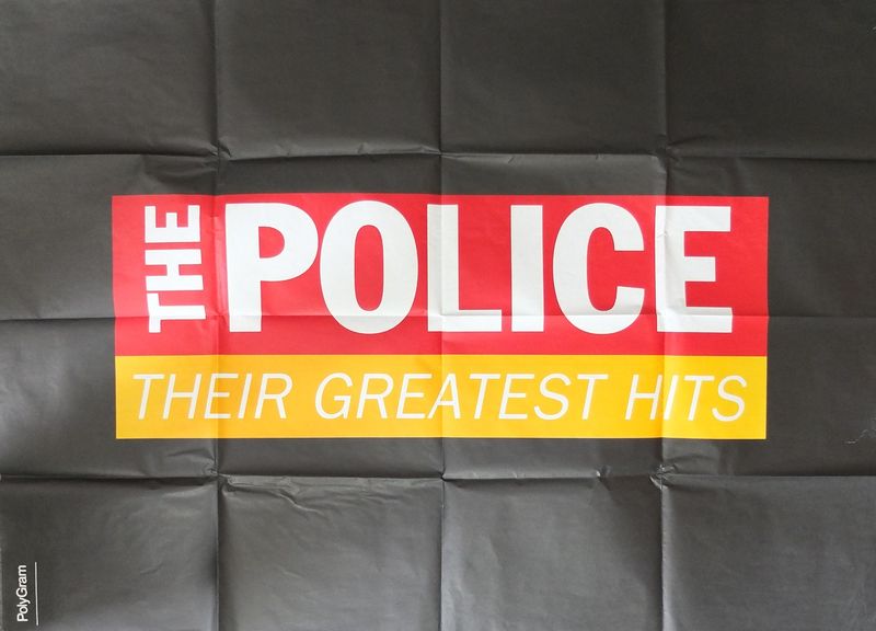 File:Their Greatest Hits poster.jpg
