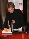 Andy signing his book - photo by Olivier Culli