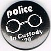 Police In Custody 79 black white letters round.jpg